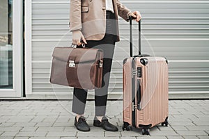 Briefcase and suitcase side by side symbolize professionalism and travel photo