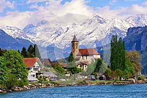 Brienz town near Interlaken and snow covered Alps mountains, Switzerland