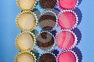 Brigadeiro Beijinho and Bicho de Pe: sweets from Brazil. Child b photo