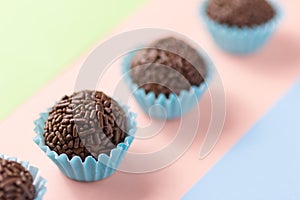 Brigadeiro is a chocolate truffle from Brazil. Cocoa and sprinkles of chocolate. Children birthday party sweet. Candy balls in st