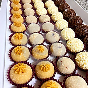 Brigadeiro sweets: dulce de leche, chocolate, pistachio, hazelnut cream and beijinho photo