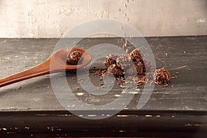 Brigadeiro (Brigadeiro) Traditional Brazilian sweet. Chocolate candies on dark background photo