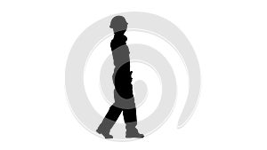 Brigadier girl comes with a drill in her hands. Silhouette. White background. Side view