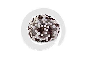 Brigadier with white and black crunchy balls isolated on white background