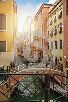 Brige through canal waters of Venice Italy