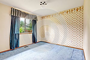 Brigh empty room with blue curtains and carpet floor