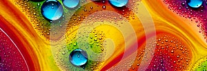 Bright abstract colorful liquid background with drops and bubbles
