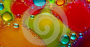Bright abstract colorful liquid background with multi-colored drops and bubbles