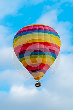 Bright air balloon in blue sky