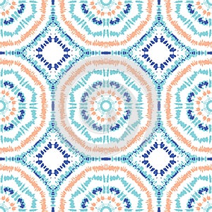 Bright Aqua, Orange and Blue Tie-Dye Shibori Sunburst Kaleidoscope Mirrored Hexagon Mandala Vector Seamless Pattern