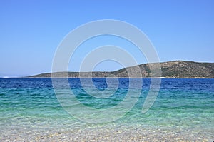 Bright azure blue ocean water in Greece, Agios Dimitrios beach