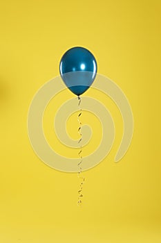 Bright balloon on color background