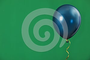 Bright balloon on color background. Celebration time