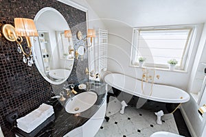 Bright bathroom in baroque style