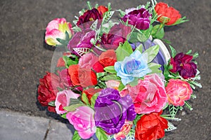 Bright and beautiful colors of plastic flowers. Various color flower background wall. Floral background. Lot of artificial flowers