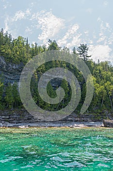 Bright beautiful landscape of Niagara Escarpment limestone cliff