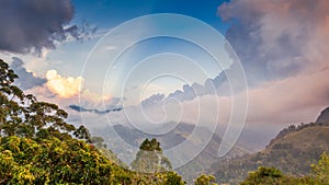 Bright beautiful landscape, sunset sky over the mountains