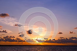 Bright beautiful sunrise or sunset at sea, Nature beautiful light sunset or sunrise over sea, colorful dramatic majestic scenery