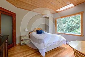 Bright bedroom in a rustic cottage