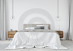 Bright bedroom with a wooden bedside table and a stylish chandeliers