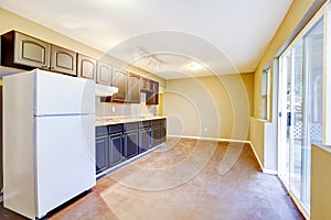 Bright beige kitchen room interior in old house.