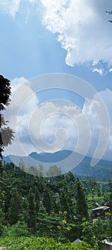 Bright blue clouds accompanied by white mist