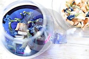 Bright blue color butterfly pea flower herb tea in a glass teapot