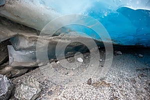 Bright blue ice glacier close up. Norway mountains