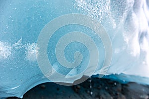 Bright blue ice glacier close up. Norway mountains