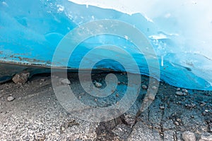 Bright blue ice glacier close up. Norway mountains