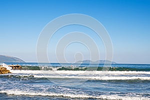 Bright blue ocean in a clear blue sky, with islands on the horizon, Vlore, Albania