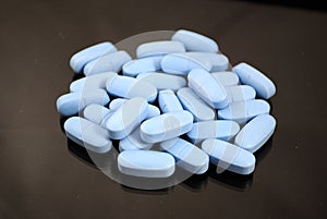Bright blue oval tablets