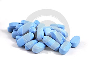 Bright blue oval tablets