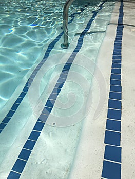 Bright blue pool water closeup