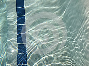 Bright blue pool water closeup