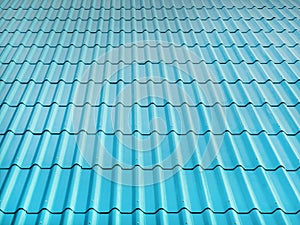 Bright blue roof tiles reflect sunlight and look beautiful, Texture of fiber cement roof sheet for background