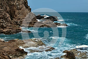 Bright blue sea and cliffs