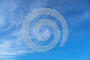 Bright blue sky with clouds as abstract background