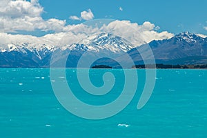 Bright blue waters of Lake Pukaki, a major tourist attraction on New Zealand`s South Island