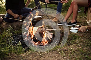 Bright bonfire at campsite in the evening