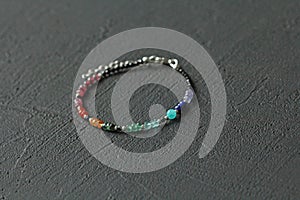 Bright bracelet made of natural stones. Carnelian  amazonite  turquoise  black spinel  ruby â€‹â€‹and emerald. Handmade jewelry.