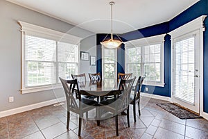 Bright breakfast nook with ceramic floors