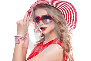 Bright cheerful girl in summer hat, colorful make-up, curls and pink manicure. Beauty face.