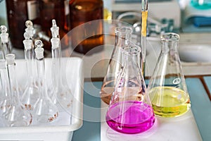 Bright chemistry in flasks on the desktop