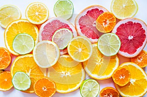 Bright citrus fruits on a white background.