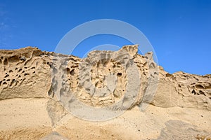 Bright cliffs formed by a volcano