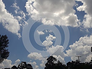 Bright cloudy blue skies overhead during the day 7