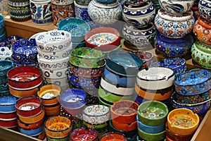 Bright colored enamel bowls in  Grand Bazaar