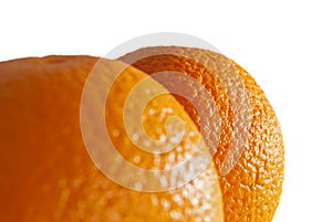 Bright colored sides of two oranges on white background