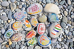 Bright colored stones on the beach